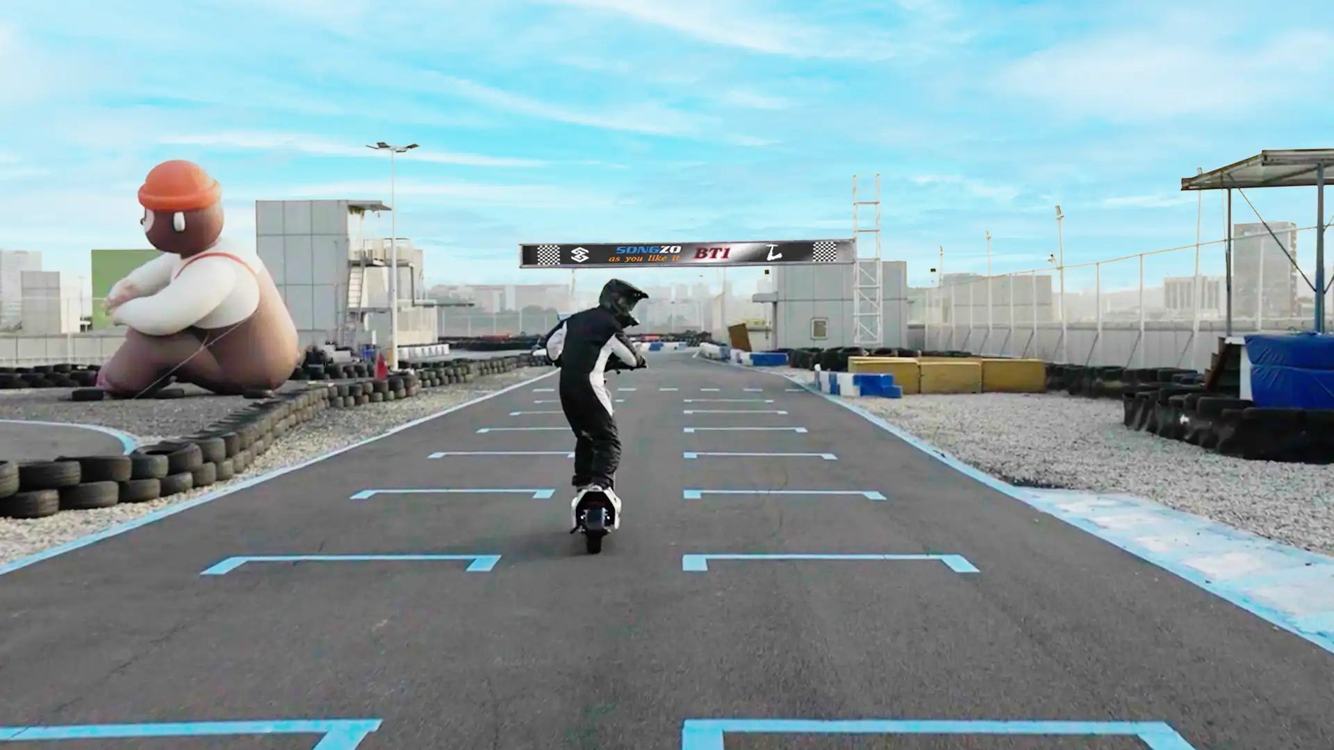 A man competing in an electric scooter race